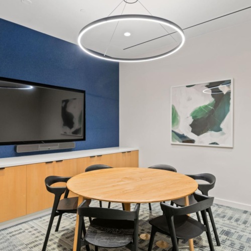 Enjoy our resident-only features a room with a table and chairs