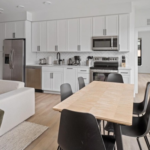 Gorgeous living areas to entertain and enjoy a kitchen with a dining table