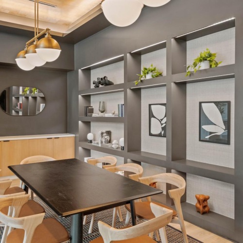 The essence of exceptional living a room with a table and chairs